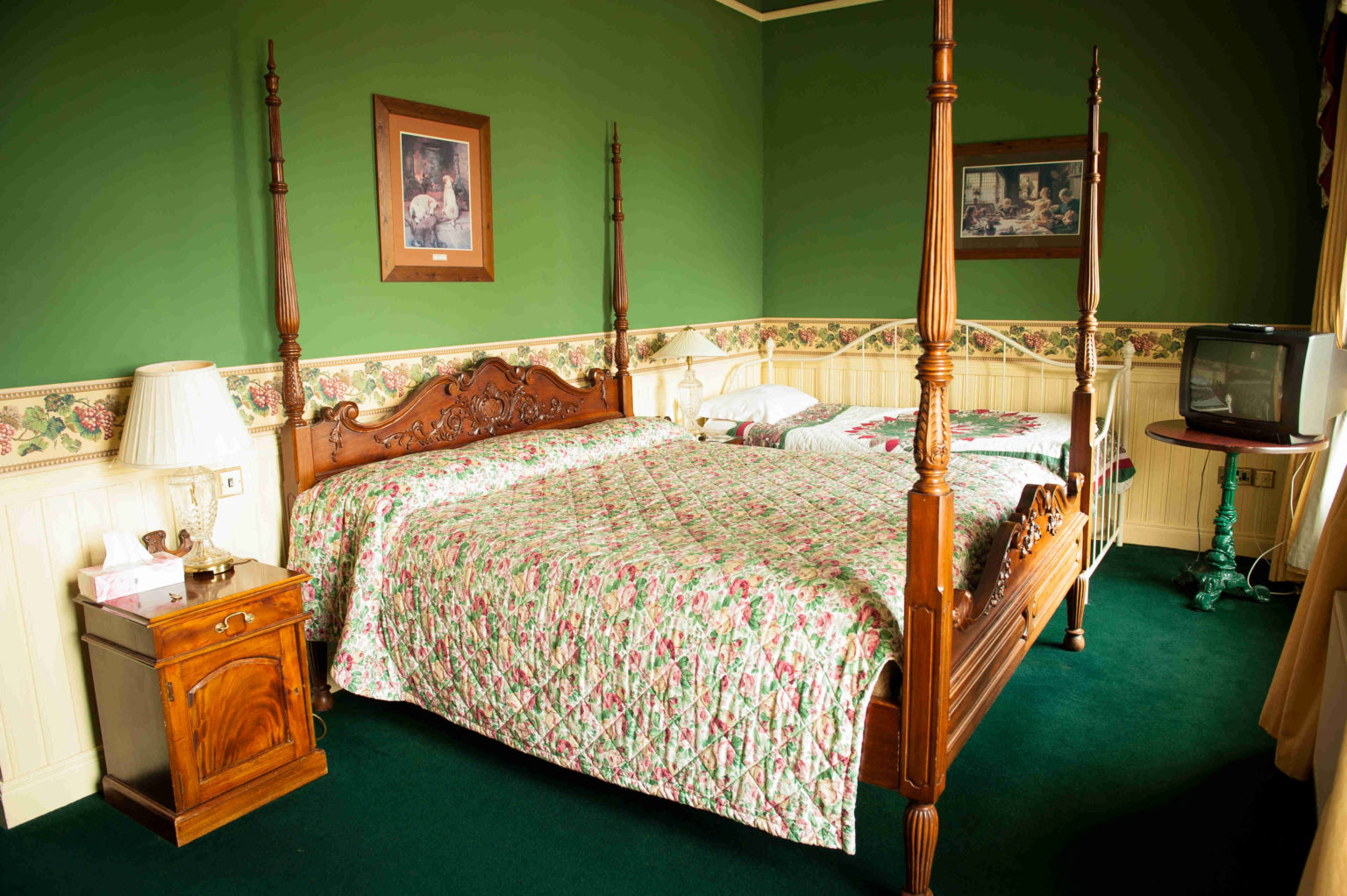 A four-poster double bedroom at the manor.